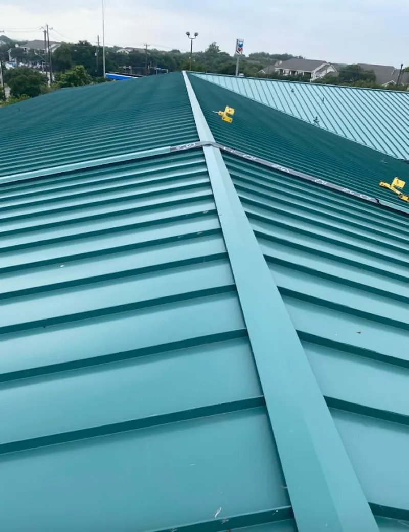 Green commercial metal roof ridge and valley for Metal Roof Repair in Framingham