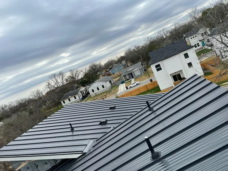 Standing seam metal roof panels with vents for Skylight Repair in Framingham